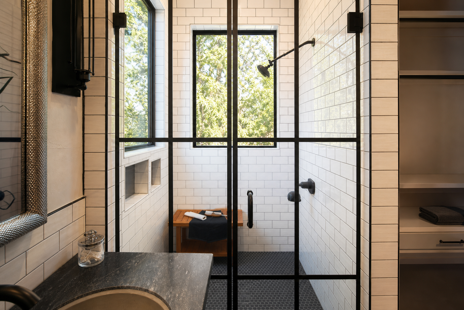 Custom black grid glass enclosure installed in a luxury Texas home